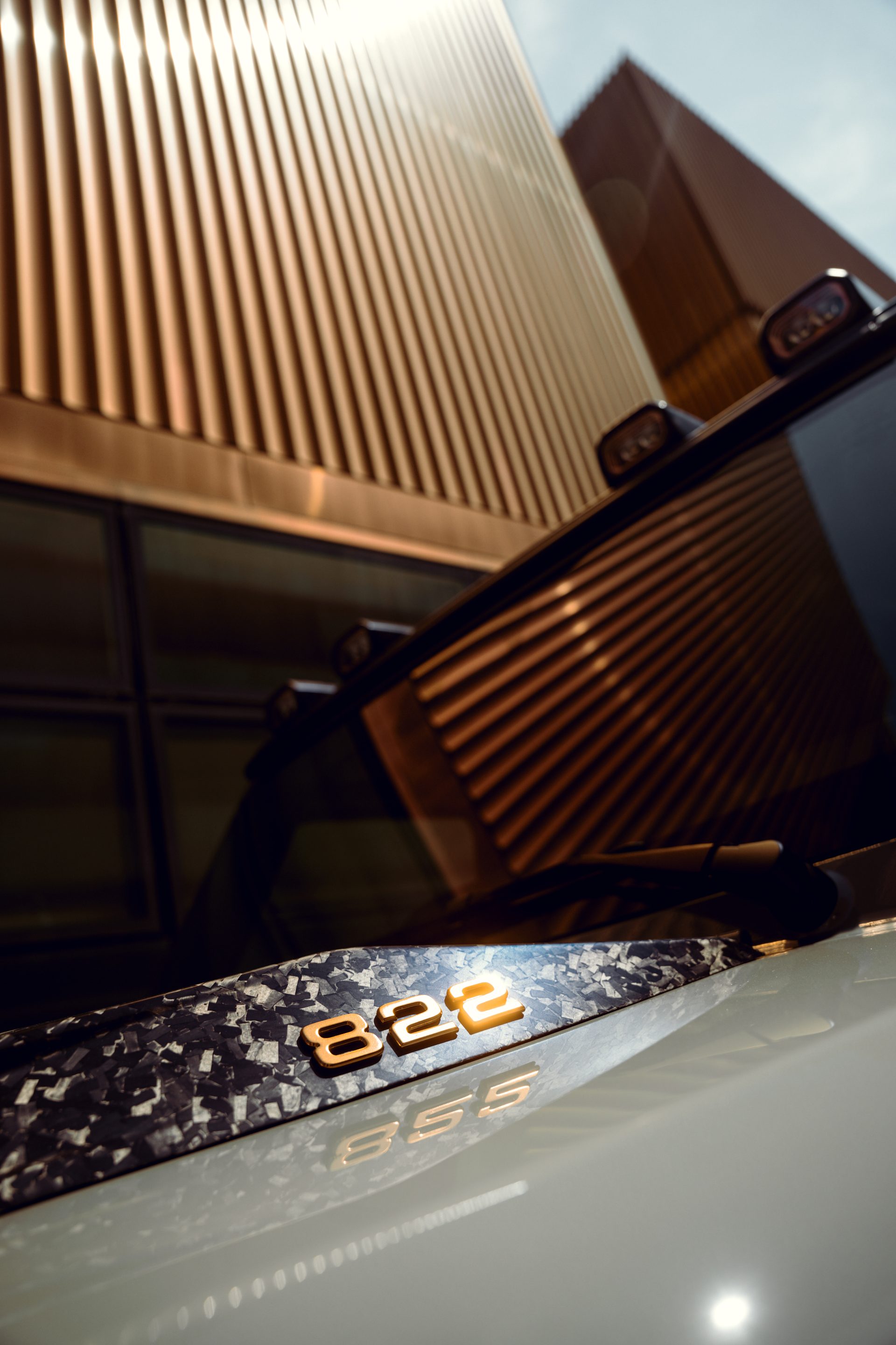 822 badge of the IMSA Precision 822 against architecture